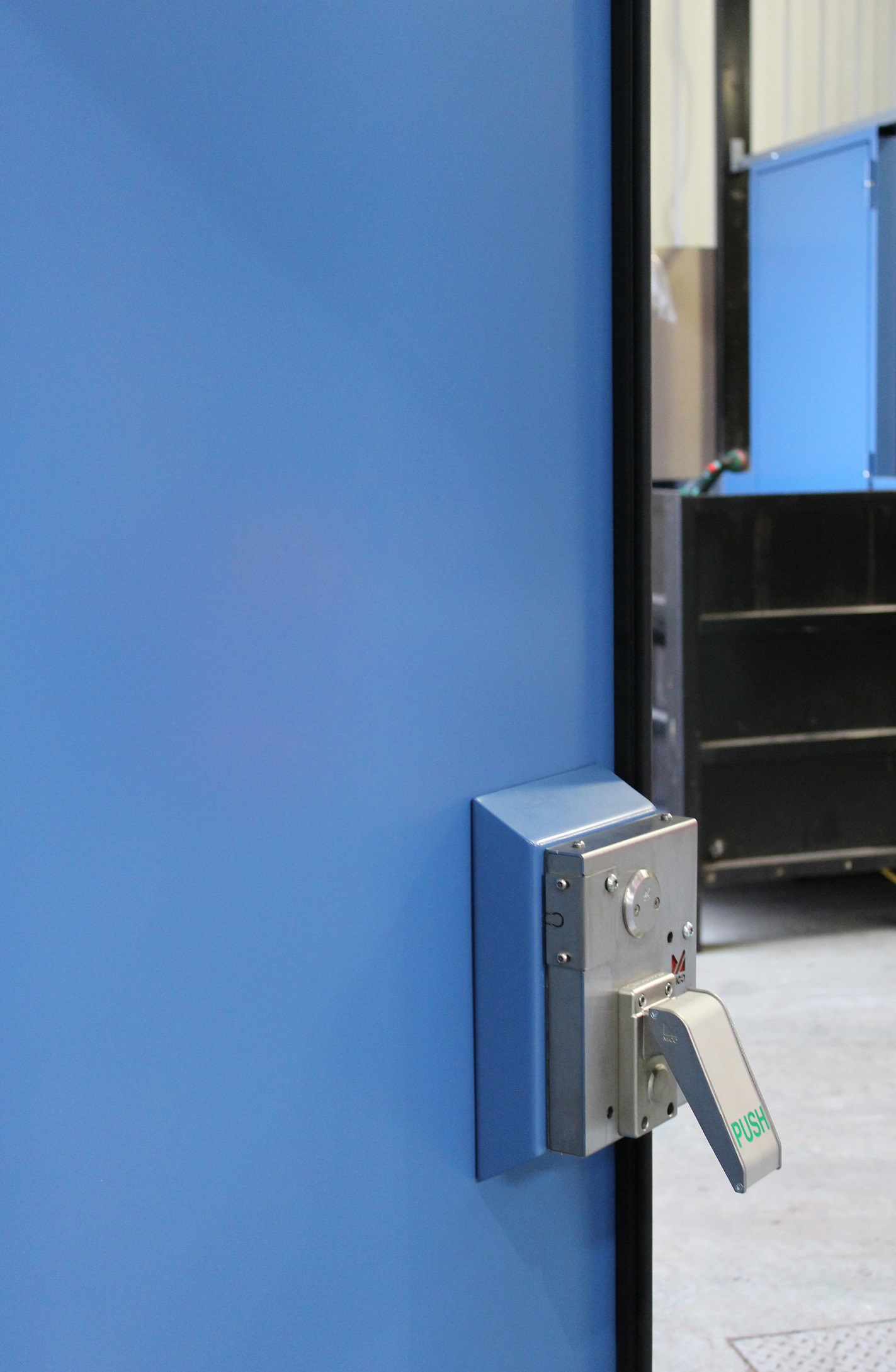 Flood door internal hardware